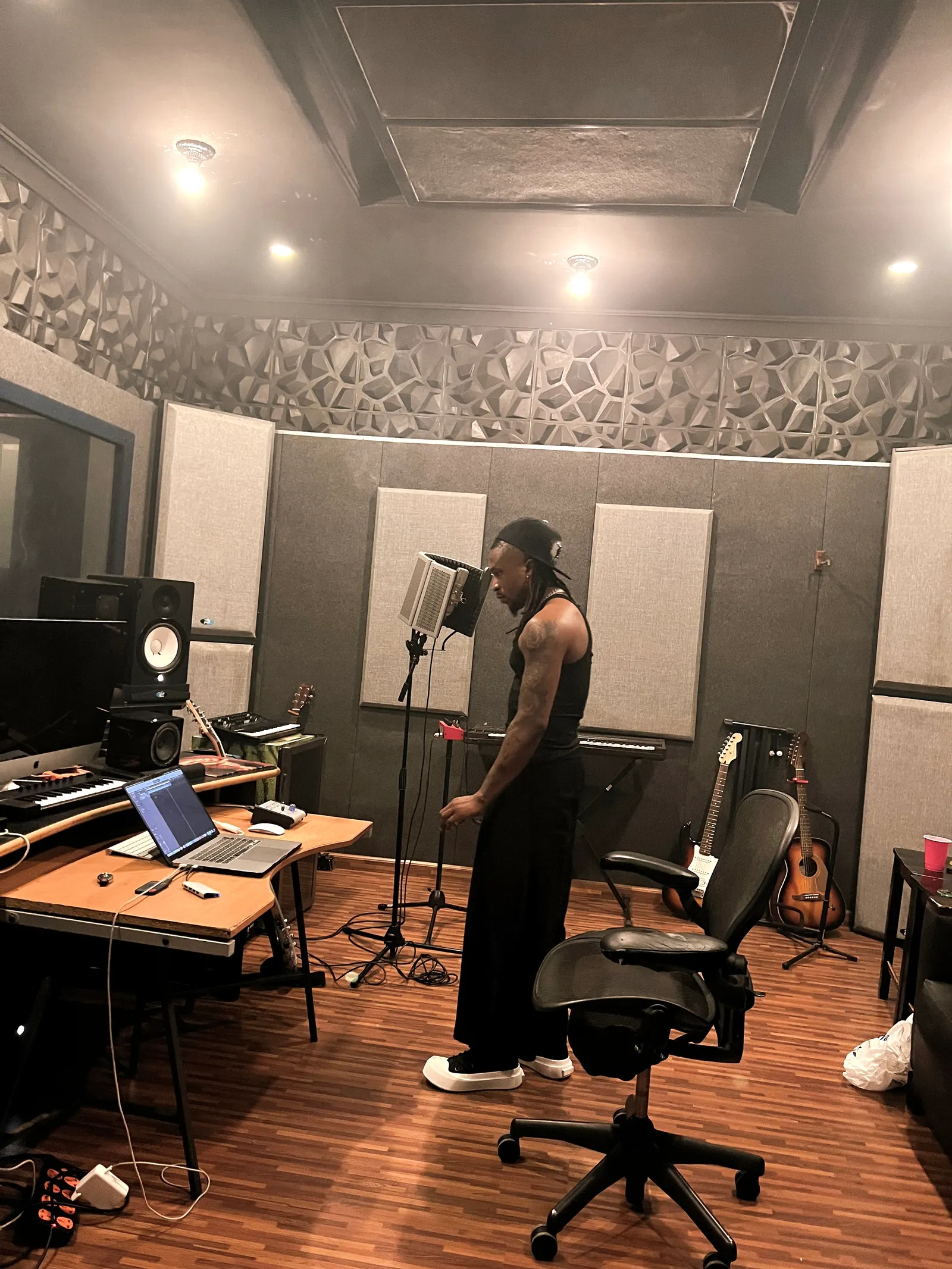 Blaisebeatz standing in a recording studio